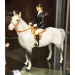 Beswick model of a huntswoman on a dappled grey ho