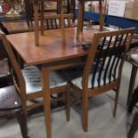 1970's style dining table and four chairs.