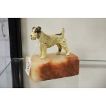 Cold painted bronze figure of a terrier on onyx ba