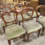 A set of six mahogany crown back dining chairs.