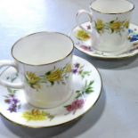 Royal Worcester, two Kentmere pattern coffee cans