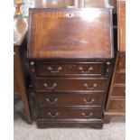 Reproduction mahogany veneered bureau.