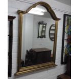 A gilt framed archform wall mirror, 107 cm high, 8