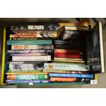 Four boxes of books, including military reference,