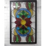 A 20th century leaded coloured glass panel, flower