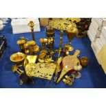 A brass trivet, galleon decoration, a square brass