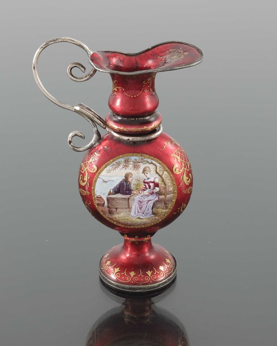 A Viennese silver gilt and enamelled small ewer