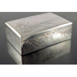 A large Japanese silver box, Meiji, circa 1900, cuchion topped cuboid form