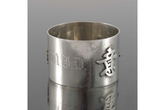 A matched set of four Chinese export silver napkin rings, Wang Hing, Hong Kong circa 1900 - Image 1 of 2