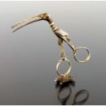 A pair of 18th century gilt stork and baby ribbon threaders