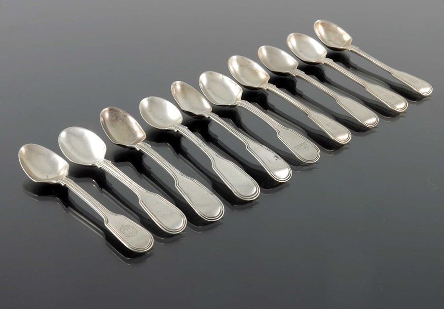 A matched set of ten George III and later silver egg spoon