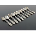 A matched set of ten George III and later silver egg spoon