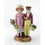 Early 19th Century Staffordshire pottery figure group of the Dandies