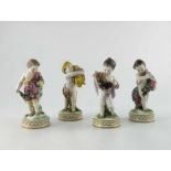 A set of four Continental allegorical porcelain figures of the seasons