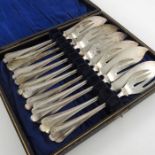 A set of Dutch silver fish eaters