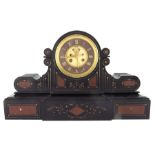 A 19th century black marble mantle clock