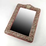 An Edwardian silver easel back mirror, Henry Matthews, Chester 1905, embossed and reticulated foliat