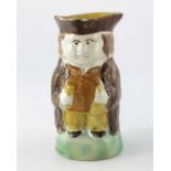 A miniature Staffordshire Prattware pottery toby jug, circa 1810