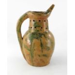 A late 19th Century Donyatt pottery Devon baluster form puzzle jug