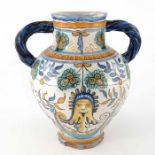 A 19th century maiolica twin handled medicine vase or jar