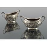 A pair of Victorian silver salt cellars, Nathan and Hayes, Chester 1897