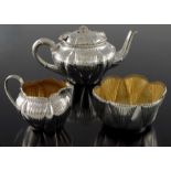 A matched Victorian and Edwardian silver three piece tea set, J Sherwood and Sons, Birmingham 1900 a