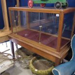 A mahogany museum display cabinet on stand, 134 x