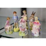 Six Royal Doulton figures of children, including O