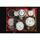 A collection of pocket watches and wrist watches i