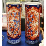 A pair of Imari pattern vases, cylindrical form.