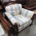 Two bergere armchairs, with upholstered cushions