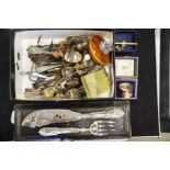 A collection of silver plated flatware and silver