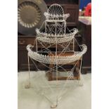 A French wirework three tier plant stand.