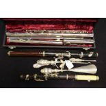 An Embassy silver plated Basson flute, boxed, tog