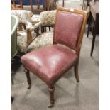 A Victorian leather upholstered walnut chair, padd