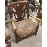 A 1940s low upholstered chair