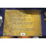 A brass wall plaque, Royal Naval School of Leaders