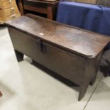 A 17th century boarded chest, carved fluted line b