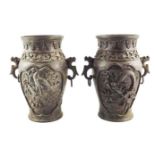 A pair of Japanese bronze vases with dragon and ri