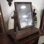 A Victorian mahogany toilet mirror, square base on