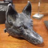 A cast lead fox mask