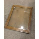 Three oak framed and glazed notice boards, with hi