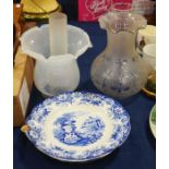 A late 19th Century blue and white warming plate w