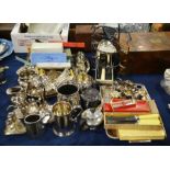 A collection of silver including flatware, tankard