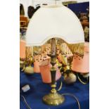 Brass table lamp with beaded shade and a pair of