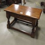 A golden oak joint stool table, 61cm wide, 43cm hi