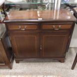 A reproduction satinwood strung cabinet, of small