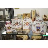 Four Sansome Chinese armorial style tea caddies