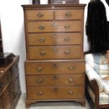 A George III oak chest on chest, three graduated d
