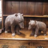 A Black Forest style carved wooden bear and cub (
